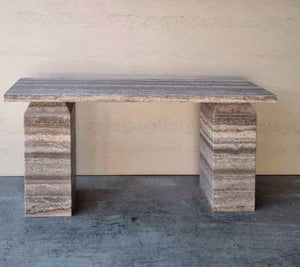 Grey textural travertine obelisk column console, brutalist in design but contemporary in style.
