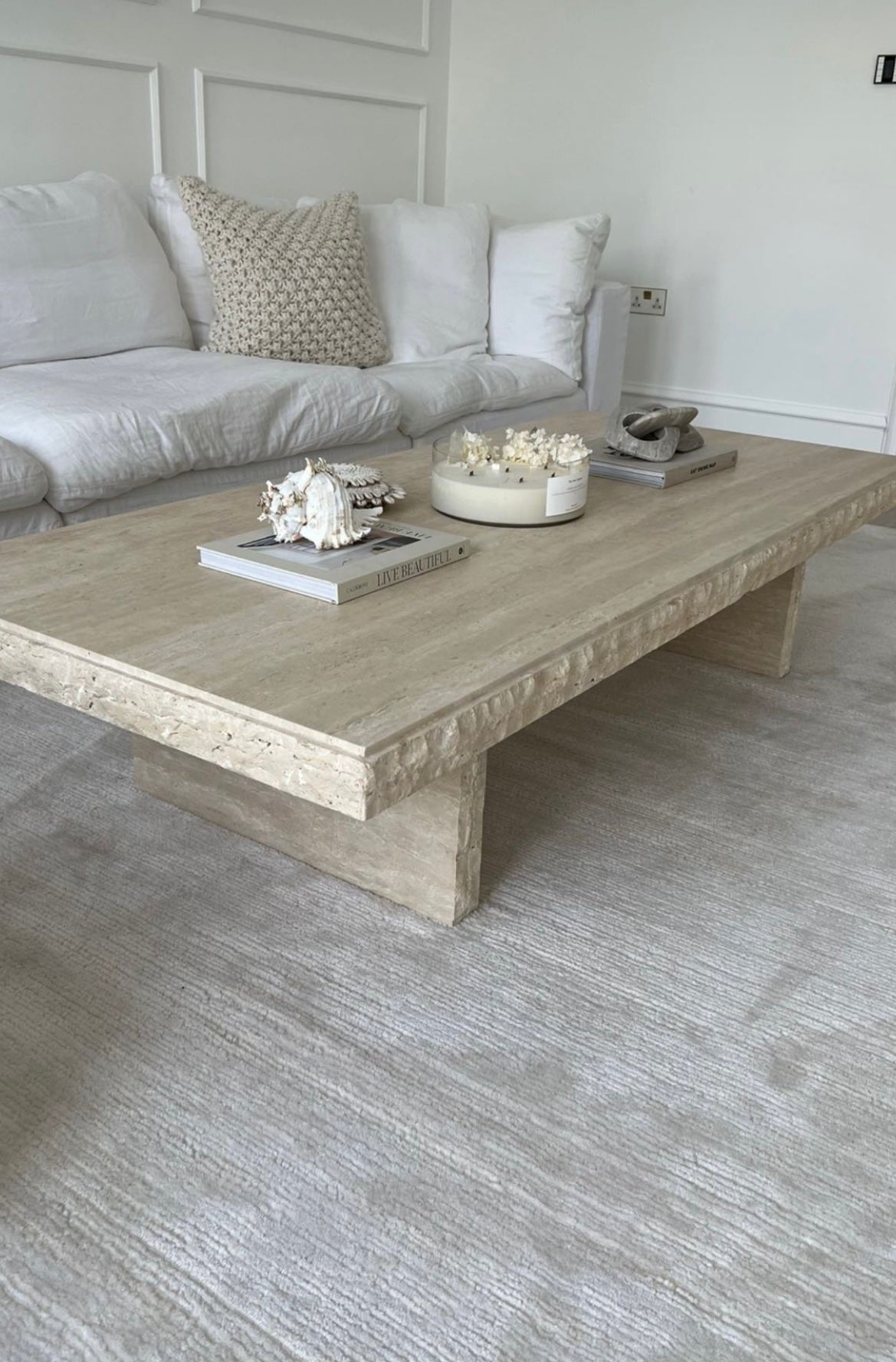 Original light beige travertine stone raw edged coffee table, in natural matte finish.