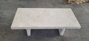 Omani marble beige raw edged coffee table.