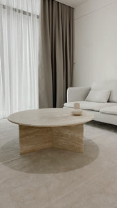 Large round travertine coffee table with Y base