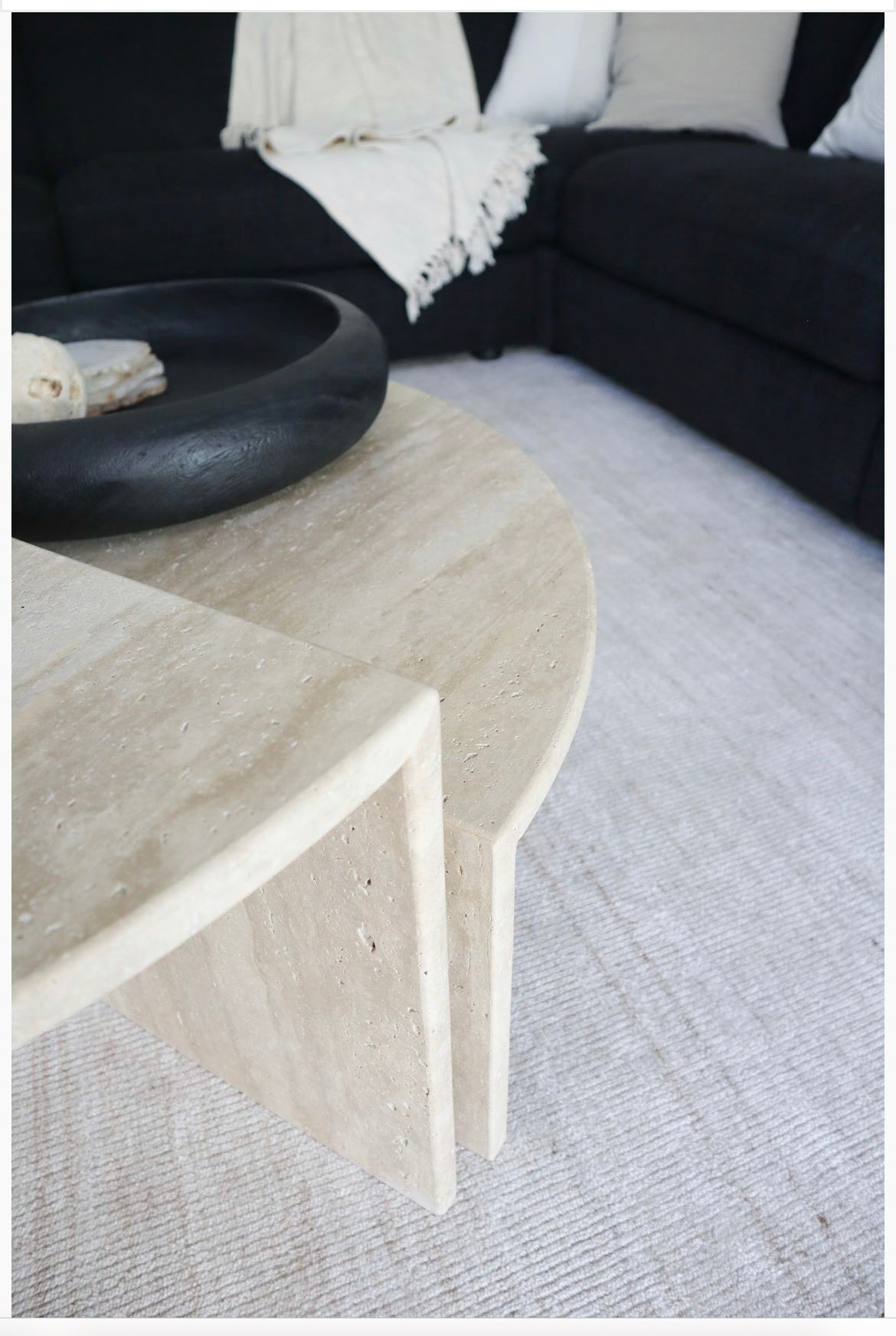 Close up of PAIO coffee tables with light beige natural travertine.
